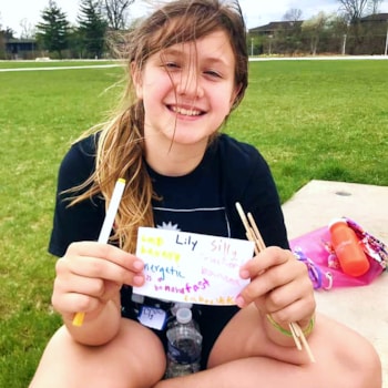Girls on the Run participant sharing her affirmations during an outdoor practice.